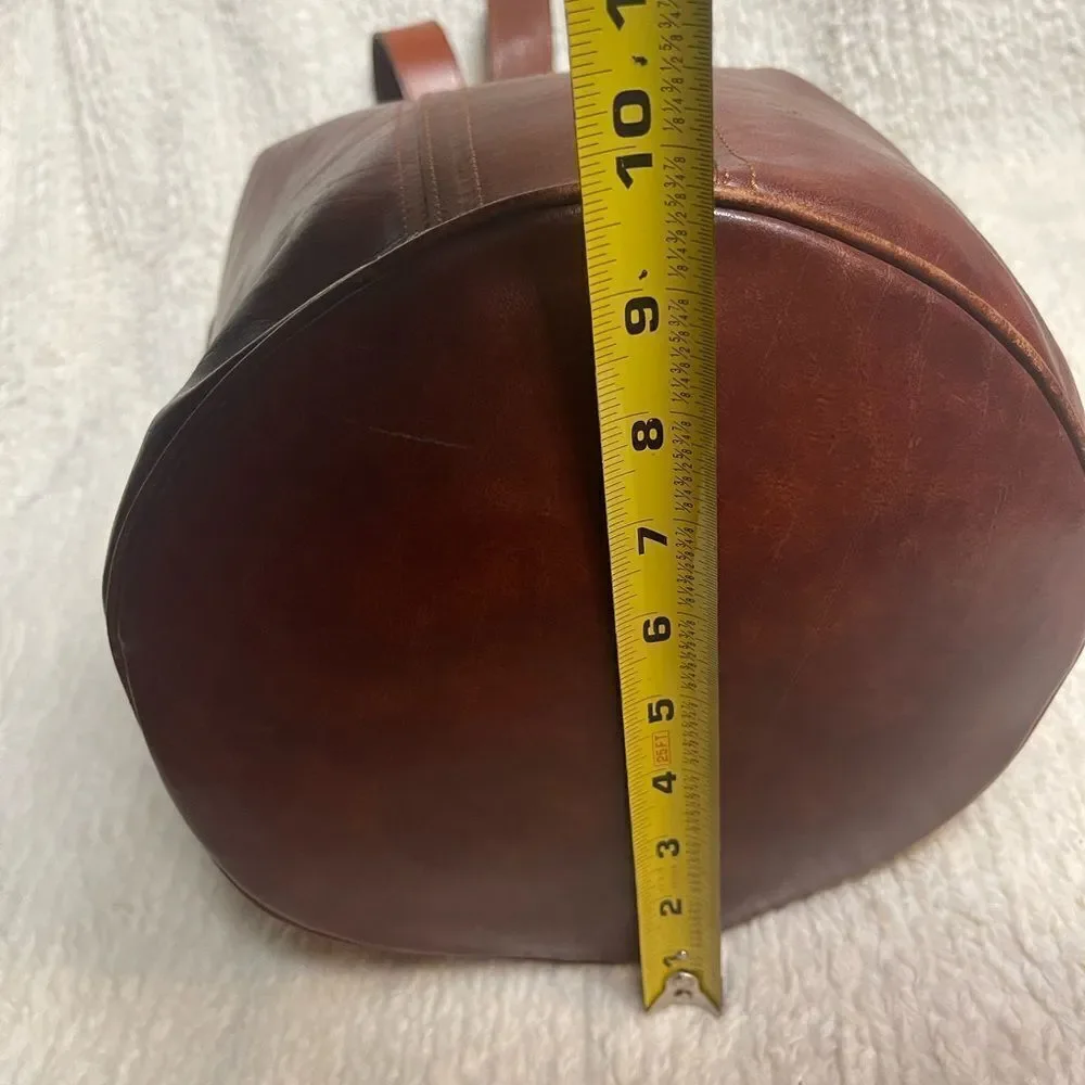 Fortune Duck vintage leather Brown sling back bucket style  bag.